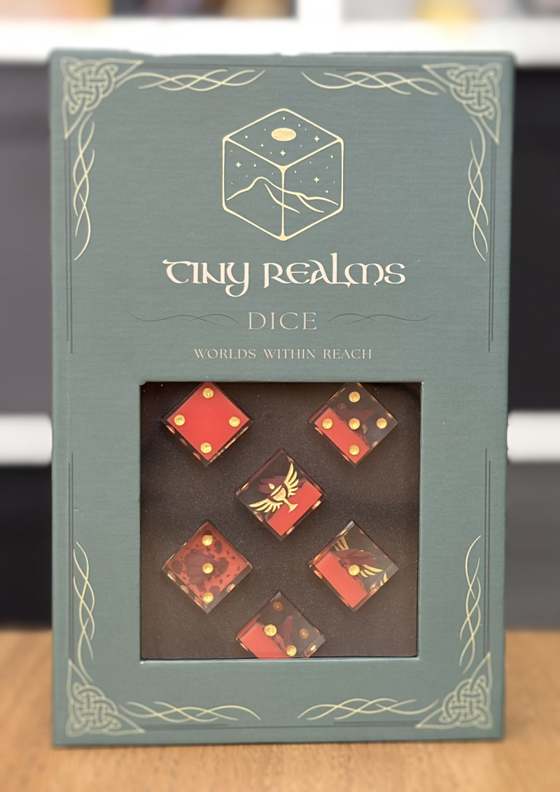SKU002 dice in their packaging with the box closed